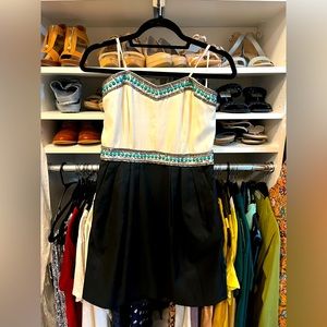 Gorgeous strapless mini dress with pockets in excellent condition.